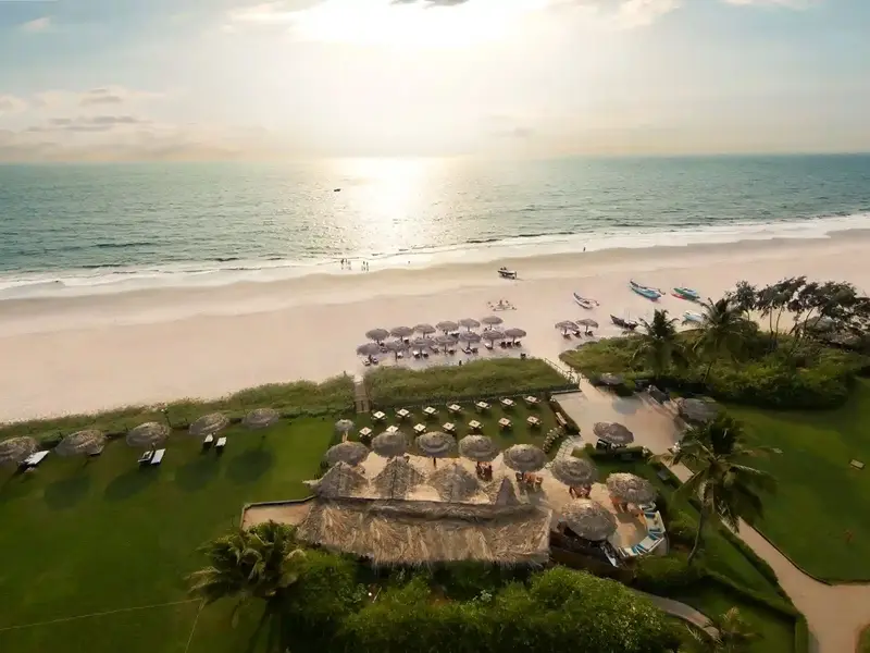 Aerial of the Taj Goa beachfront resort at golden hour