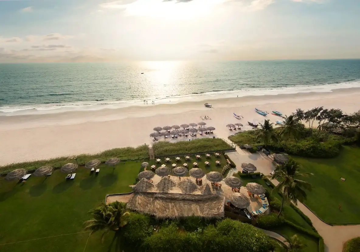 Aerial of the Taj Goa beachfront resort at golden hour